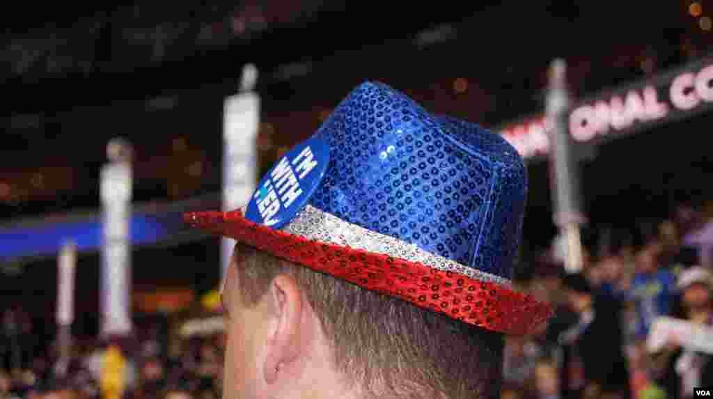 Delegates sport their hats at the DNC in Philadelphia (Photo: S. Barua/VOA)