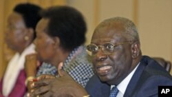 United Nations Food and Agriculture Organization Director General Jacques Diouf (R) speaks during an emergency meeting in Rome about the famine crisis in the Horn of Africa, August 18, 2011