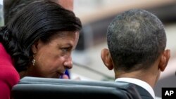 FILE - Then national security adviser Susan Rice talks with then president Barack Obama at a nuclear security summit, in Washington. April 1, 2016. President Donald Trump claims Rice illegally disclosed names of his associates who were mentioned in intel reports last year.