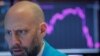A trader works on the floor of the New York Stock Exchange, Feb 27, 2020. Wall Street's main indexes tumbled for a sixth straight session.