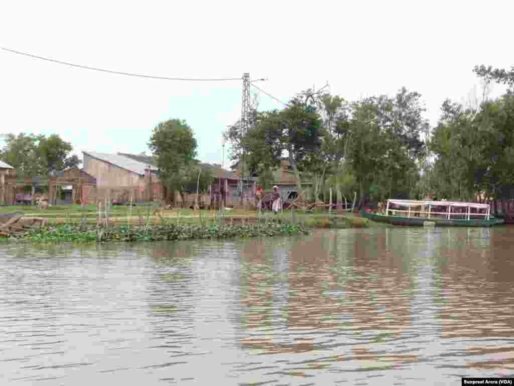 Clinics in remote locations are difficult to reach, limiting the access to health care for villages like this one in Benin. (Sunpreet Arora) 