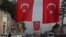  A main street decorated with Turkish flags near the Reina club four days after the New Year's day attack, in Istanbul, Wednesday, Jan. 4, 2017. 