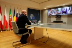 The President of the European Council Charles Michel participates in a video conference of world leaders from the Group of 20 and other international bodies and organizations, from Brussels, Belgium, March 26, 2020.