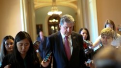 Sen. Joe Manchin, D-W.Va., speaks to reporters before attending a meeting on infrastructure on Capitol Hill in Washington, June 23, 2021.