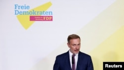 Germany's Free Democratic Party leader and Finance Minister Christian Lindner speaks following his meeting with leaders of German mid-size and family companies, in Berlin, Germany, Oct. 29, 2024.