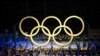 Fireworks illuminate over National Stadium during the opening ceremony of 2020 Tokyo Olympics, July 23, 2021, in Tokyo.