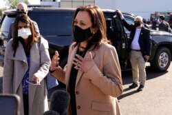 Democratic vice presidential candidate Sen. Kamala Harris, D-Calif., speaks to the media after arriving at Sky Harbor International Airport, Oct. 28, 2020, in Phoenix.