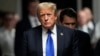 FILE - Former President Donald Trump walks to make comments to members of the media after a jury convicted him of felony crimes for falsifying business records in a scheme to illegally influence the 2016 election, in New York, May 30, 2024. 