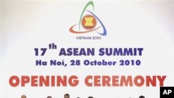 ASEAN leaders join hands for their group photo session at the opening ceremony of the 17th ASEAN Summit and related summits in Hanoi, Vietnam, Thursday, Oct. 28, 2010. Delegation members from left are.,Malaysian Prime Minister Najib Razak, Myanmar's Prime