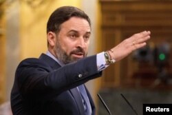 FILE - Santiago Abascal, leader of far-right party Vox, speaks at parliament in Madrid, Spain, Oct. 22, 2020.