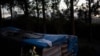 A migrant rests in a makeshift shelter in Las Raices camp in San Cristobal de la Laguna on the Canary Island of Tenerife, Spain, March 17, 2021. 