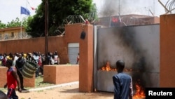 Pro-junta protesters gather outside the French Embassy in Niamey after military coup in Niger