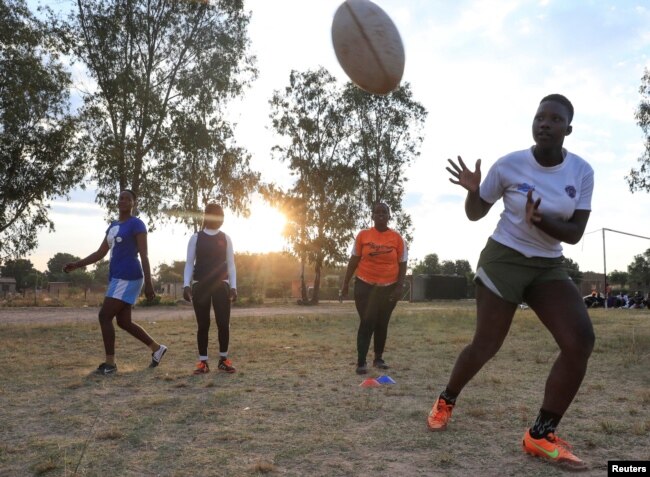 Members of the Zimbiru Rugby Academy Club, an all-female rugby team take part in a training session at Zimbiru primary school in Domboshava outside Harare, Zimbabwe, May 2, 2023. (REUTERS/Philimon Bulawayo)