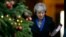 Britain's Prime Minister Theresa May leaves 10 Downing Street for Prime Minister's Questions at the House of Commons, in London, Dec. 19, 2018. 