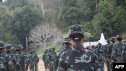 This handout photo from local media group Kantarawaddy Times taken on May 10, 2021, and released on June 4 shows military training conducted by the Karenni National Progressive Party ethnic rebel group in Kayah state, Myanmar.. 