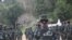 This handout photo from local media group Kantarawaddy Times taken on May 10, 2021, and released on June 4 shows military training conducted by the Karenni National Progressive Party ethnic rebel group in Kayah state, Myanmar.. 
