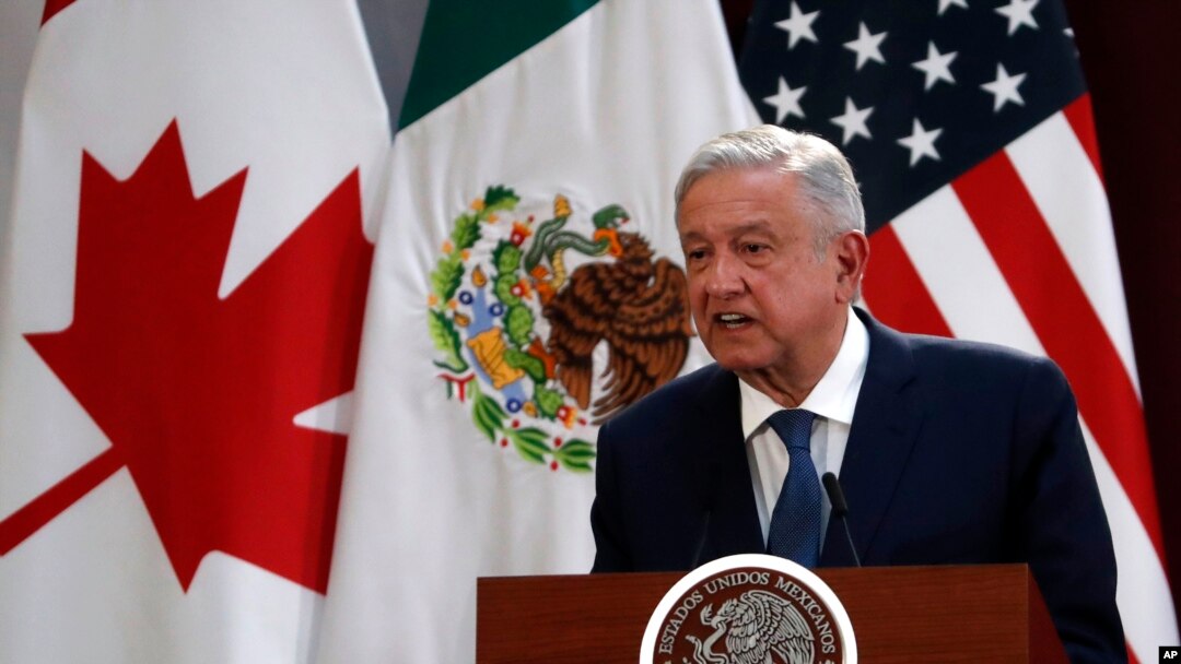 FILE - Mexico's President Andres Manuel Lopez Obrador speaks during an event to sign an update to the North American Free Trade Agreement, at the national palace in Mexico City, Dec. 10. 2019. 