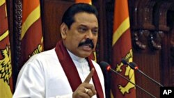 President Mahindra Rajapaksa speaks after government forces captured the Tamil Tigers' de facto capital in northern Sri Lanka (file photo – 02 Jan. 2009)