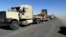 Iraqi security forces are stationed outside the city of Shirqat near Mosul, Iraq, Sept. 20, 2016. Iraqi forces have launched a new military operation to recapture a key town north of Baghdad from the Islamic State group. 