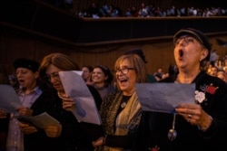 Jewish Orthodox women attend an event celebrating the completion of the 7 1/2-year cycle of daily study of the Talmud, in Jerusalem, Jan. 5, 2020.