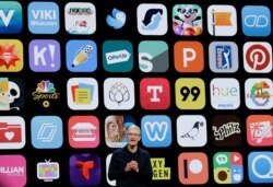 FILE - Apple CEO Tim Cook speaks during the Apple Worldwide Developers Conference in San Jose, Calif., June 4, 2018.