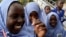 Schoolgirls play outside El-Kanemi Islamic School, where both Western and Islamic curriculums are taught, in Maiduguri.
