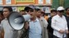 Pro-ruling party demonstrators stage a protest rally in front of National Assembly, in Phnom Penh, Cambodia, Oct. 26, 2015. 