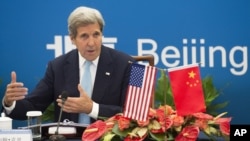 Menlu AS John Kerry di Beijing (7/6).