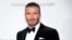 Soccer legend David Beckham poses for photographers upon arrival at the amfAR charity gala during the Cannes 70th international film festival, Cap d'Antibes, southern France, May 25, 2017. Beckham, who is married to fashion mogul Victoria Beckham, will launch 21 men’s grooming products under the name House 99 on Feb. 1 in the United Kingdom, exclusively at Harvey Nichols stores.
