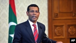 Maldives' first democratically elected president Mohamed Nasheed announces his resignation in a nationally televised address in Male, Maldives, February 7, 2012.