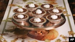 FILE - Mini chocolate pecan pies are seen at the Institute of Culinary Education in New York, Sept. 30, 2016. 