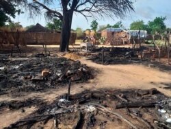 This photo shows aftermath of an attack in the village of Masteri in west Darfur, Sudan Saturday, July 25, 2020.