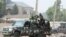 FILE - Nigerian military secure an area in Maiduguri, Nigeria, Feb. 16, 2019.