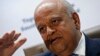 South Africa's Finance Minister Pravin Gordhan gestures during a media briefing after he was reappointed to the position by President Jacob Zuma in Pretoria, South Africa, Dec. 14, 2015. 