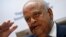 South Africa's Finance Minister Pravin Gordhan gestures during a media briefing after he was reappointed to the position by President Jacob Zuma in Pretoria, South Africa, Dec. 14, 2015. 