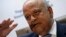 South Africa's Finance Minister Pravin Gordhan gestures during a media briefing after he was reappointed to the position by President Jacob Zuma in Pretoria, Dec. 14, 2015. 