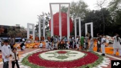 অমর একুশে, ভাষা শহীদ দিবস এবং আন্তর্জাতিক মাতৃভাষা দিবসের কর্মসূচি। এপি ফাইল ছবি। 