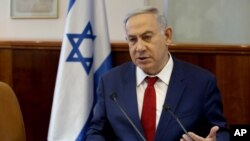 Israeli Prime Minister Benjamin Netanyahu heads the weekly cabinet meeting at the Prime Minister's office in Jerusalem, May 15, 2016. Netanyahu lashed out at Iran for staging a Holocaust-themed cartoon contest that mocked the Nazi genocide of six million Jews during World War II. 