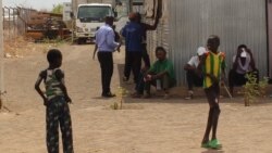 Two boys playing in the Kakuma refugee camp in Kenya.