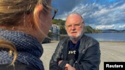 FILE - Norwegian writer Jon Fosse, who has been awarded the Nobel Prize in Literature, meets the press on a wharf at Frekhaug, Norway October 5, 2023. 