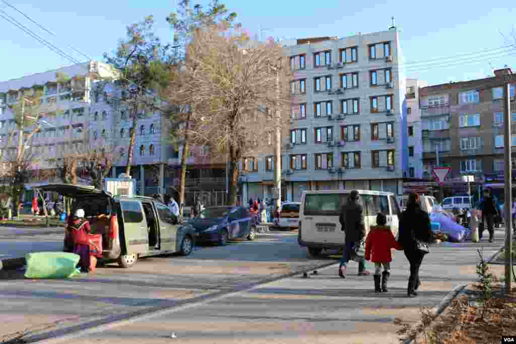 Residents living Sur district in Diyarbakir after the curfew was expanded