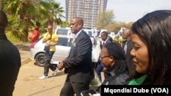 Dumelang Saleshando of the Botswana Congress Party (BCP) arrives at the High Court of Botswana in Gaborone, Sept, 28, 2024.