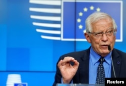 FILE - European Union foreign policy chief Josep Borrell speaks during a news conference at the European Council building, in Brussels, May 10, 2021.