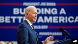 President Joe Biden speaks at Carnegie Mellon University at Mill 19 in Pittsburgh, Jan. 28, 2022.