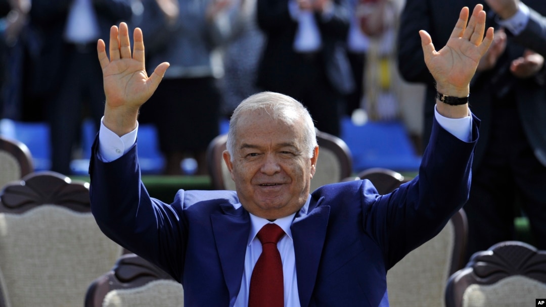 Uzbekistan's President Islam Karimov greets people during the festivities marking the Navruz holiday in Tashkent, March 21, 2015.
