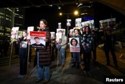 People attend a protest against the government and to show support for the hostages who were kidnapped during the deadly Oct. 7, 2023, attack, in Tel Aviv, Israel, on Jan. 4, 2025.