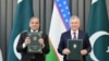 President of Uzbekistan Shavkat Mirziyoyev, right, and Pakistani Prime Minister Shehbaz Sharif exchange the joint declaration in Tashkent, Uzbekistan, on Feb. 26, 2025. (Courtesy Sharif office)