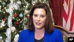 FILE - Michigan Gov. Gretchen Whitmer speaks at the Capitol in Lansing, Mich, Dec. 18, 2019.