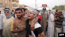 بر اثر بمب گذاری های روز یکشنبه در عراق تا کنون ۱۵۵ نفر کشته شده اند