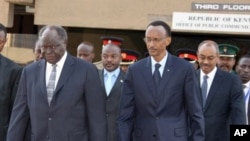 In this July 29, 2009 image made available by Kenya Presidential Press Services, Kenya's President Mwai Kibaki, left, Rwanda's President Paul Kagame, third left, and Burundi's President Pierre Nkurunziza, second left, and Zanzibar's President Dr. Abied Ka